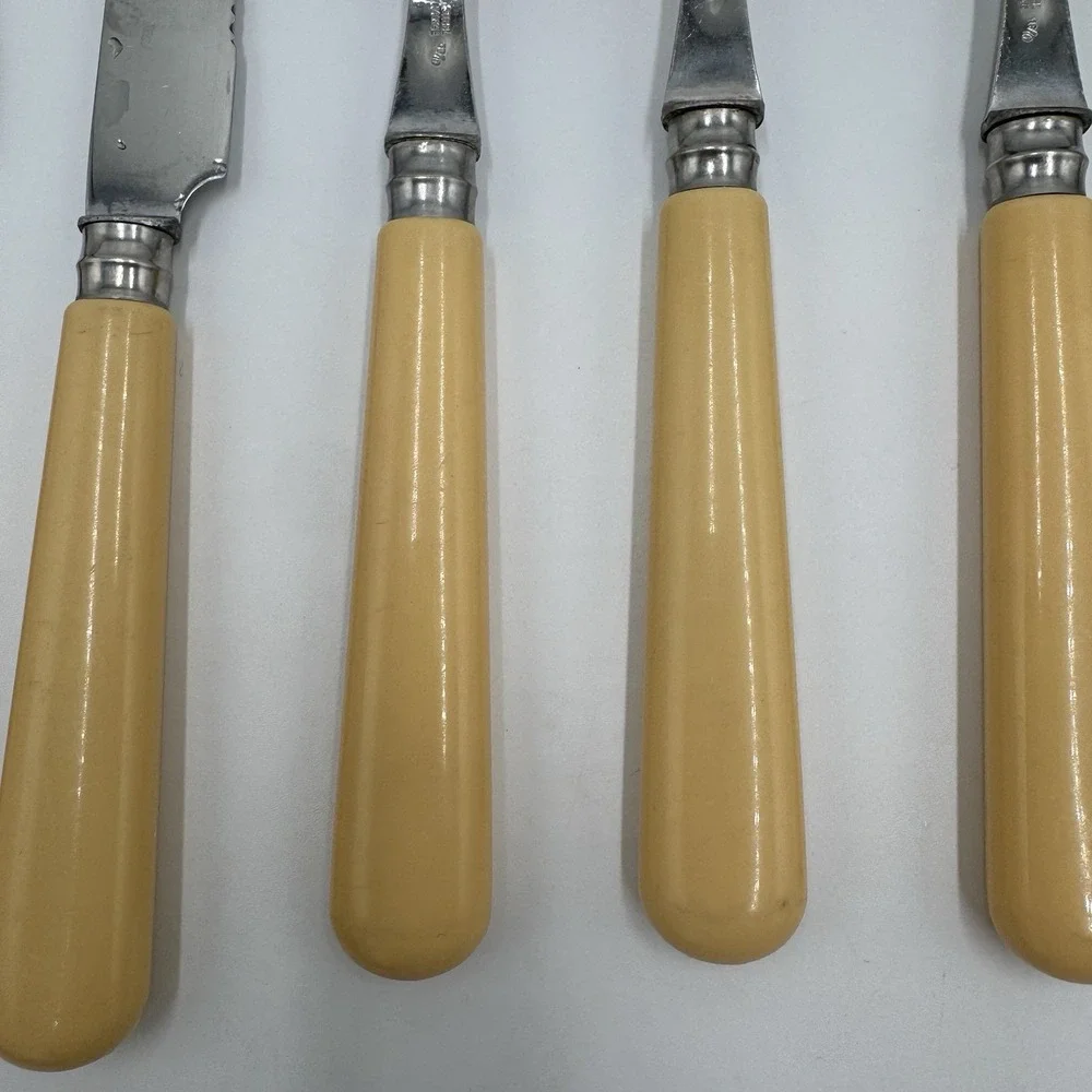 Jean Dubost Yellow Flatware 8 Pc Lot Stainless France Knives Spoons
